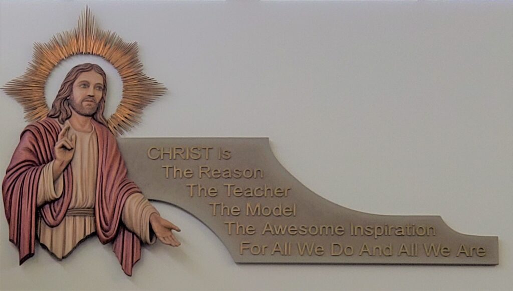 An image of Christ with the words "Christ is the reason, the teacher, the model, the awesome inspiration for all we do and all we are."